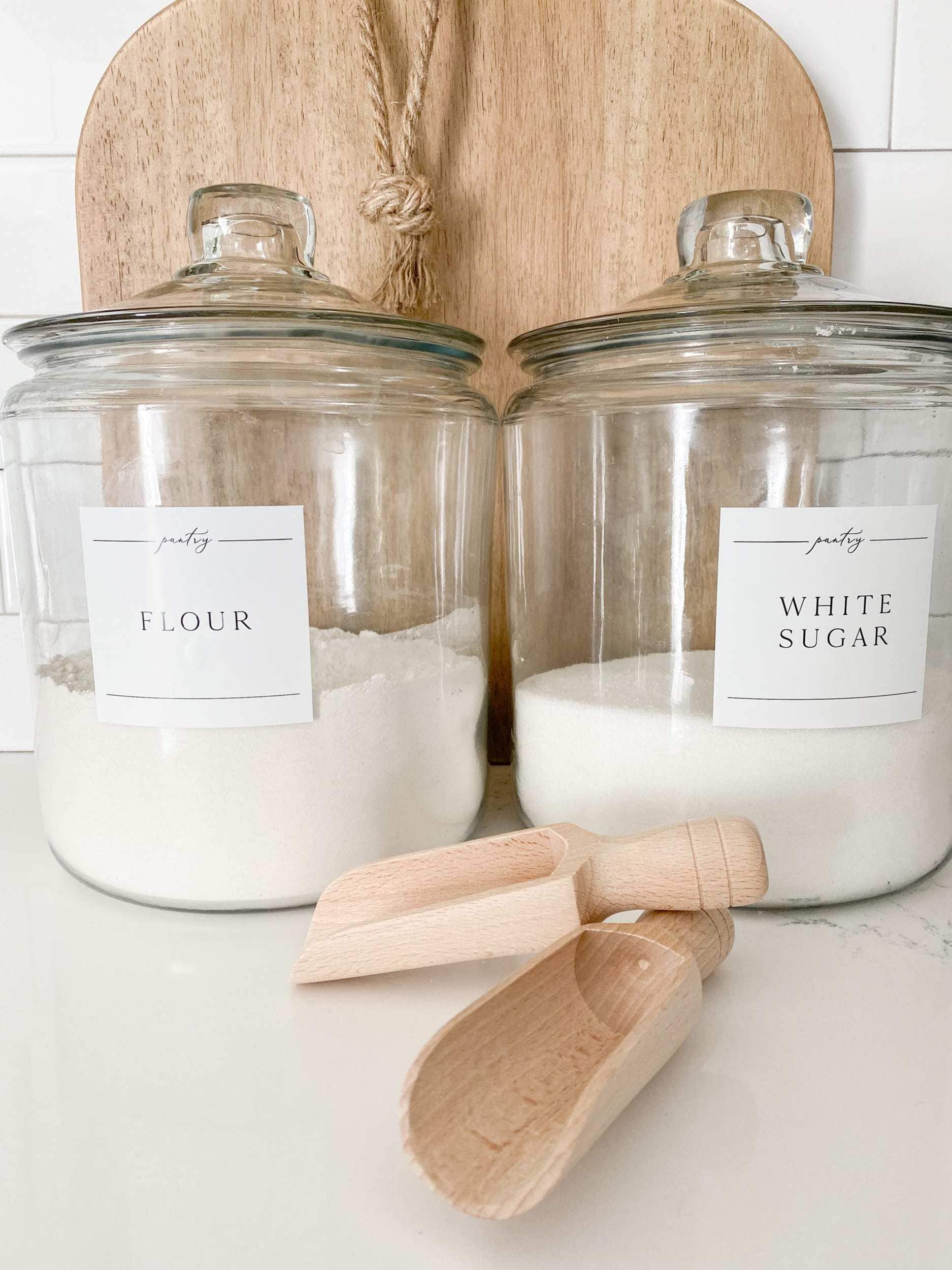 White sugar label and clear container with wooden scoop