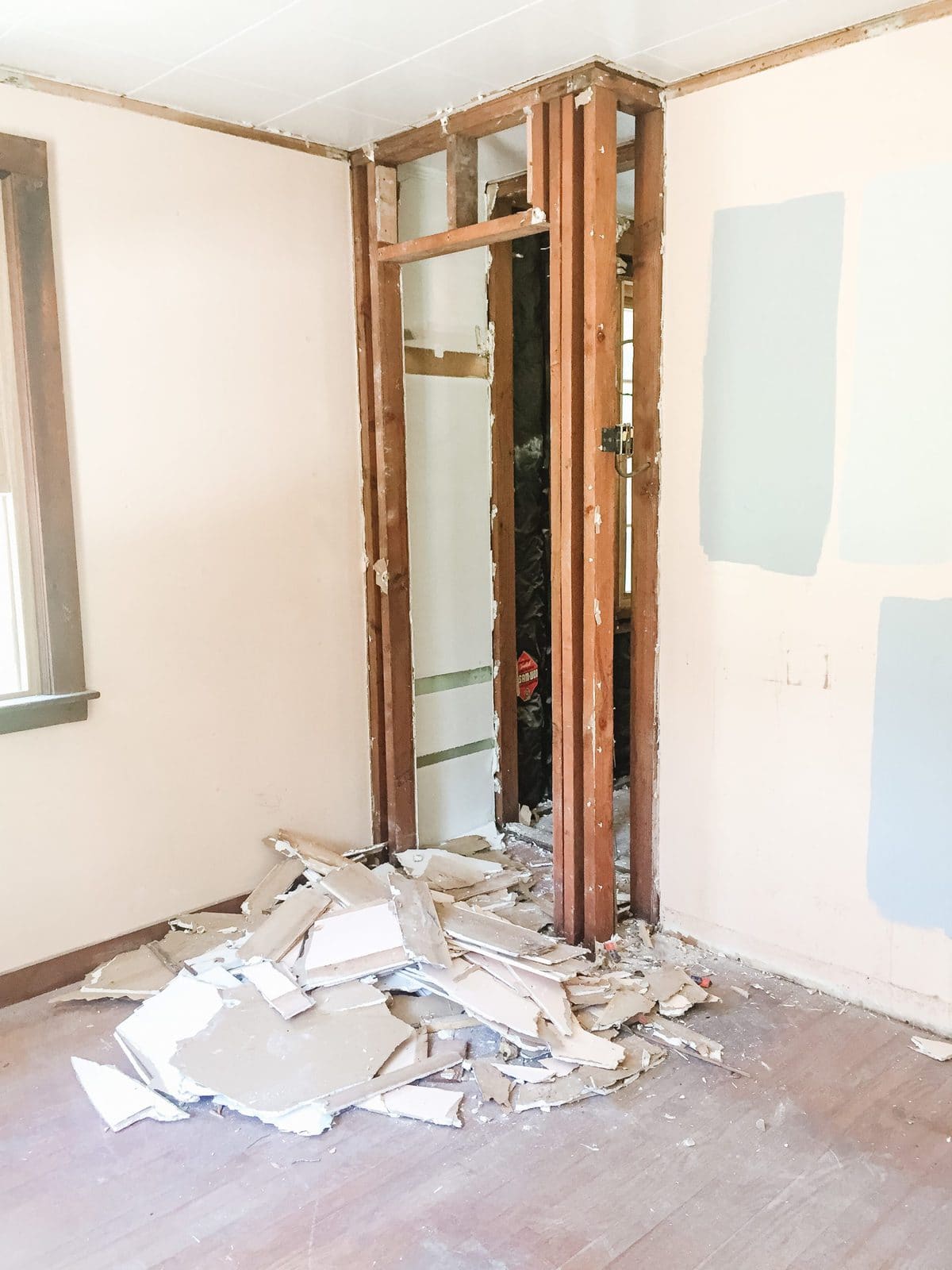 Demolition of the second closet in the old master bedroom during renovation