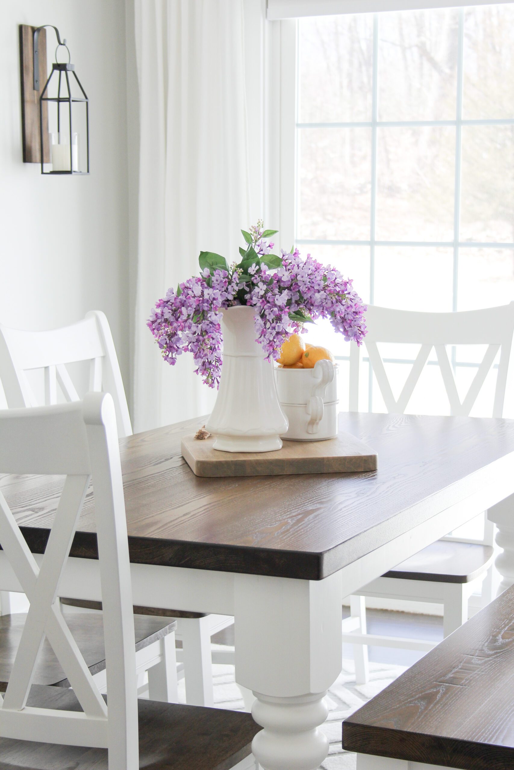 modern farmhouse dining room home decor with faux lilacs and lemons