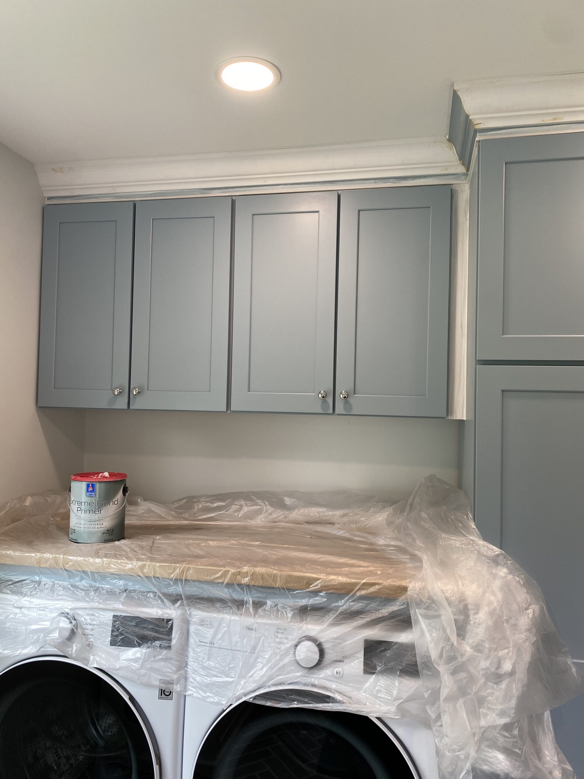 laundry room caulking and sanding